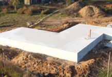 Фундамент монолитная плита: плюсы, этапы строительства